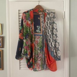 Fun patchwork shrug by Anthropologie. Perfect addition to an all white outfit!